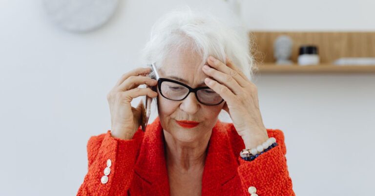 worried elderly person phone home